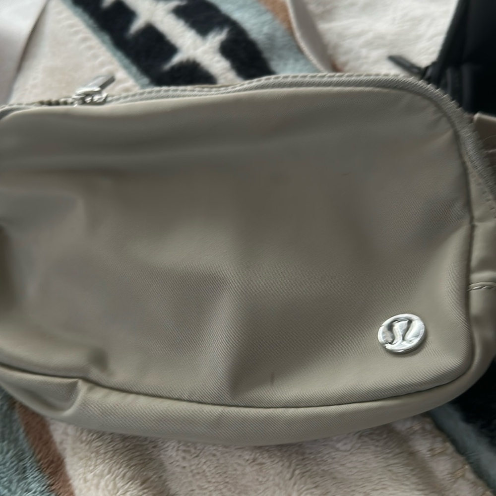 2 lululemon belt bags one tan one black